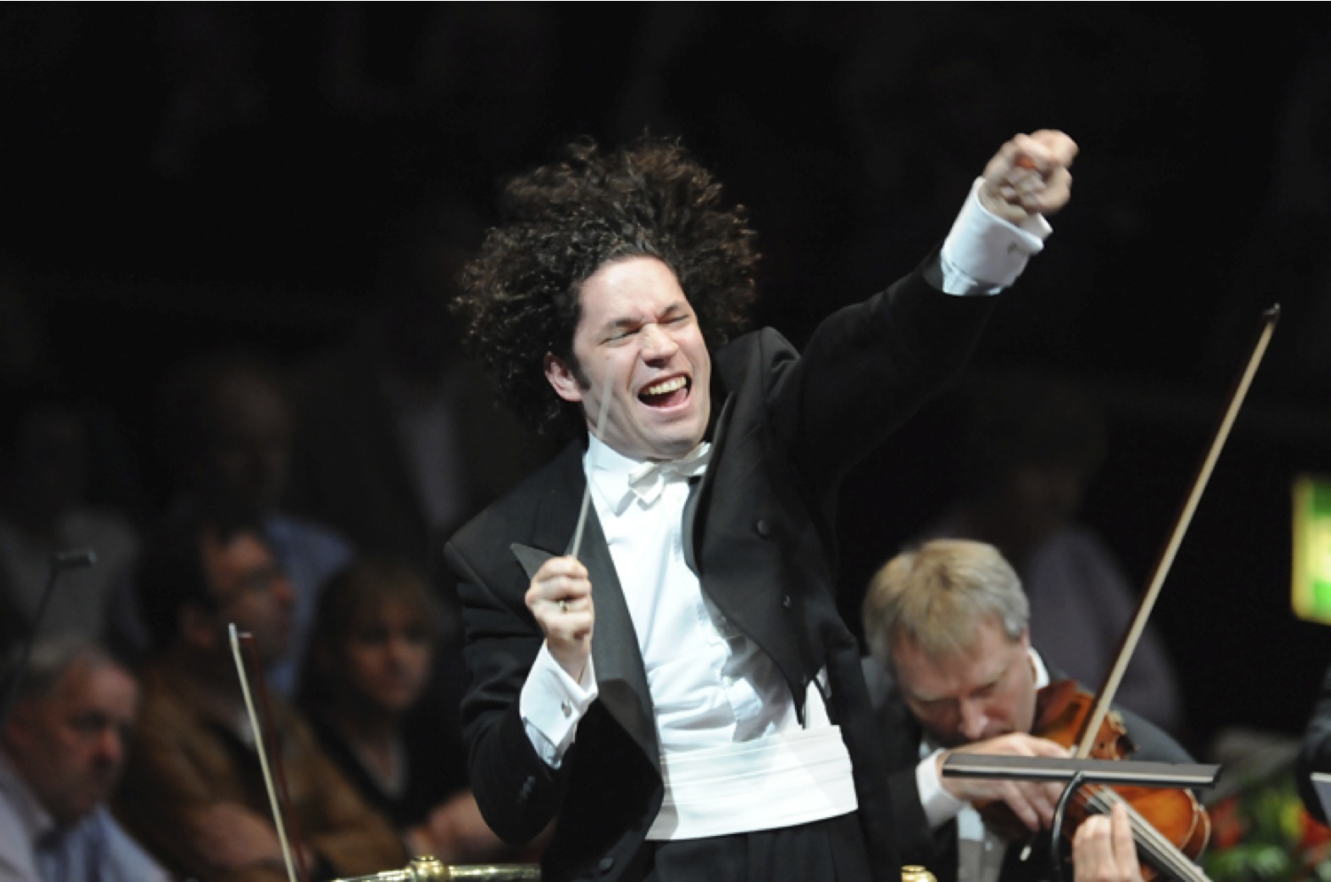 The Venezuelan conductor Gustavo Dudamel (R), his wife, the